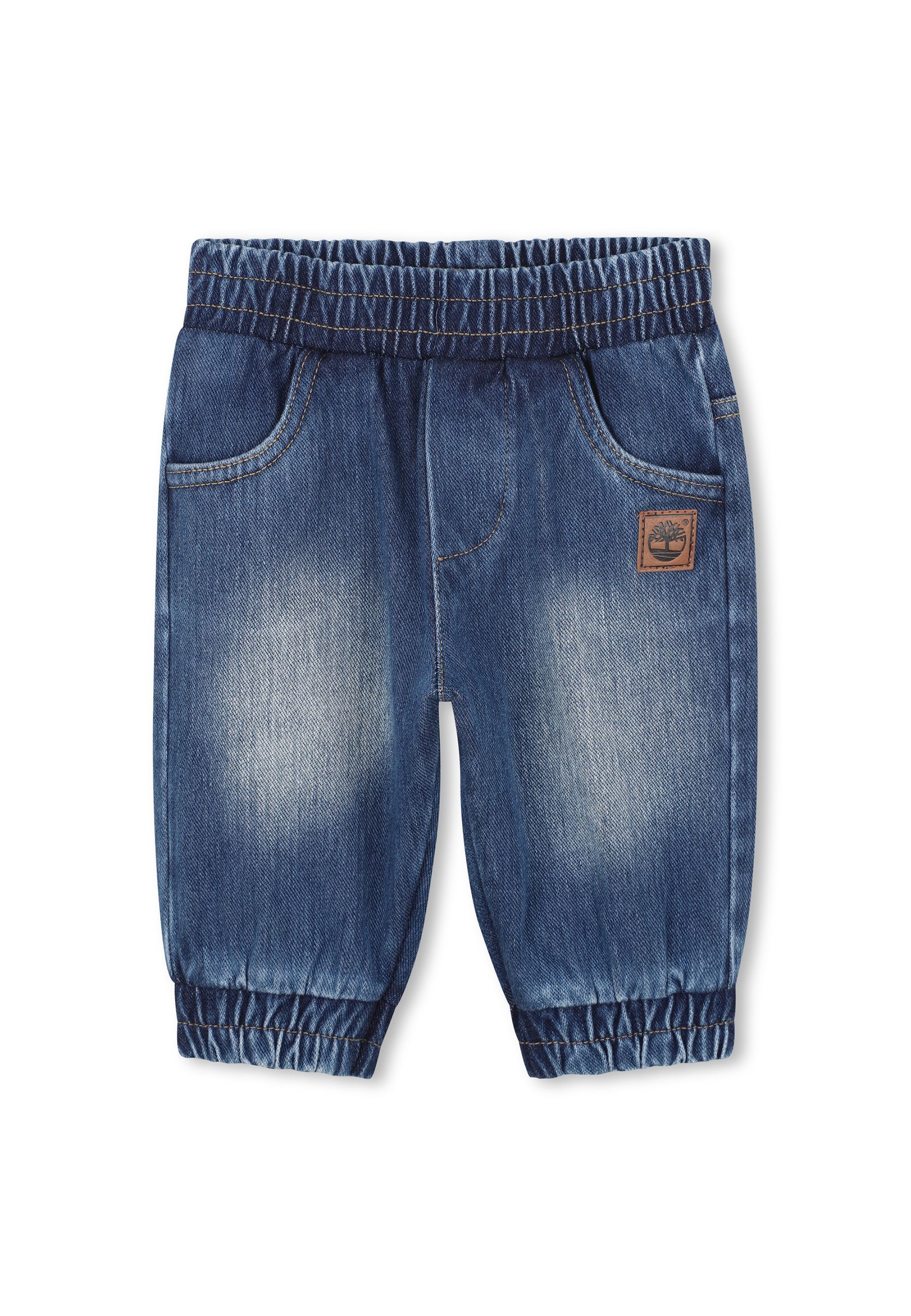Jeans in denim lavorato a maglia